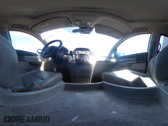 2014 Honda Odyssey Touring with VIN 5FNRL5H91EB068427, listed as a IAAI auction lot 42163315 with 184,134 mi miles and . Bid and sale history available at DreamBid. Image 24.