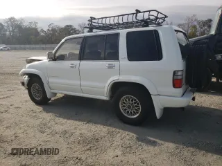 2000 Isuzu Trooper S with VIN JACDJ58X6Y7J06807, listed as a Copart auction lot 79179454 with 157,308 mi miles and Salvage title. Bid and sale history available at DreamBid. Image 2.