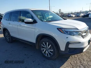 2021 Honda Pilot EX-L with VIN 5FNYF5H59MB015179, listed as a IAAI auction lot 41658099 with 46,131 mi miles. Bid and sale history available at carsss.com. Image 1.