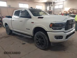 2022 Ram 2500 Laramie with VIN 3C6UR5FJ7NG253380, listed as a IAAI auction lot 41319536 with 33,945 mi miles. Bid and sale history available at carsss.com. Image 1.