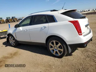 2012 Cadillac SRX Premium Collection с VIN 3GYFNFE30CS534835, выставлен на аукционе Copart как лот 63681235 с пробегом 124 964 миль миль и Списание • Salvage title. История ставок и продаж доступна на DreamBid. Изображение 2.