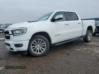 2022 Ram 1500 Laramie with VIN 1C6SRFJTXNN380198, listed as a Copart auction lot 58927115 with 26,085 mi miles and Salvage title. Bid and sale history available at DreamBid. Image 1.