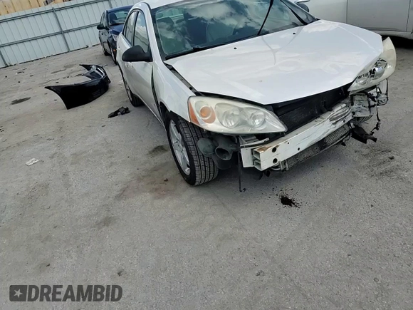 2008 Pontiac G6 z VIN 1G2ZG57N284170970, wystawiony jako Copart lot #55683425 z przebiegiem 242 854 mil mil oraz Szkoda całkowita • Salvage title. Historia ofert i sprzedaży dostępna na DreamBid. Obrazek 14.