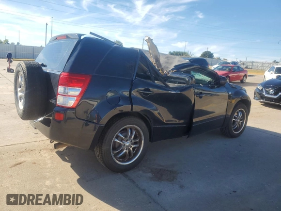 2007 Suzuki Grand Vitara z VIN JS3TE941X74202046, wystawiony jako Copart lot #80221394 z przebiegiem 153 791 mil mil oraz Szkoda całkowita • Salvage title. Historia ofert i sprzedaży dostępna na DreamBid. Obrazek 3.