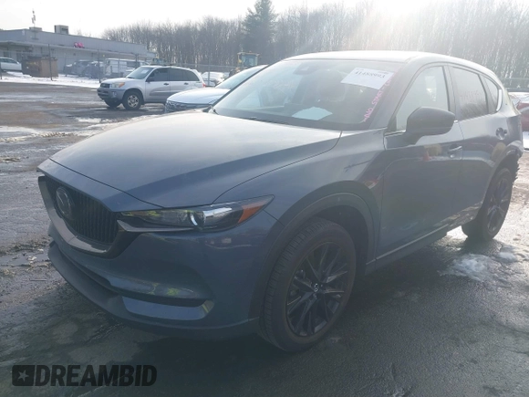 2021 Mazda CX-5 Touring z VIN JM3KFBCMXM0463469, wystawiony jako IAAI lot #41488993 z przebiegiem 28 582 mil mil oraz . Historia ofert i sprzedaży dostępna na DreamBid. Obrazek 17.