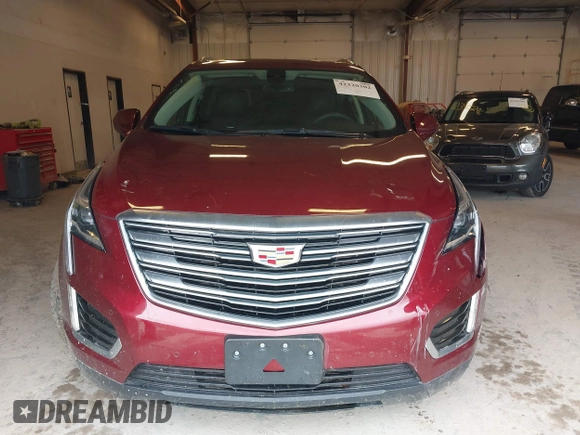 2018 Cadillac XT5 Premium Luxury AWD z VIN 1GYKNFRS6JZ114464, wystawiony jako IAAI lot #42320302 z przebiegiem 61 231 mil mil oraz . Historia ofert i sprzedaży dostępna na DreamBid. Obrazek 13.