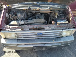 1994 Ford Aerostar with VIN 1FMCA11U3RZA85857, listed as a Copart auction lot 79948454 with 211,748 mi miles and Clean Title. Bid and sale history available at carsss.com. Image 12.