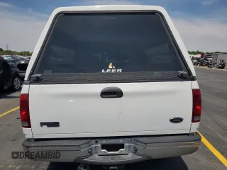 2003 Ford F-150 XL with VIN 2FTRX17L23CA17128, listed as a Copart auction lot 60144965 with 121,055 mi miles and Salvage title. Bid and sale history available at DreamBid. Image 6.