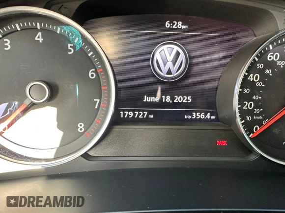 2014 Volkswagen Touareg Sport with VIN WVGEF9BP7ED003332, listed as a Copart auction lot 63043535 with 179,727 mi miles and Salvage title. Bid and sale history available at DreamBid. Image 8.