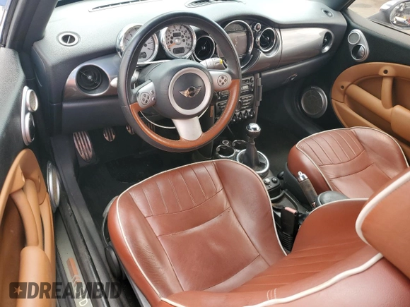 2007 MINI Convertible S with VIN WMWRH33597TJ43818, listed as a Copart auction lot 64623075 with 104,889 mi miles and Clean title. Bid and sale history available at DreamBid. Image 8.