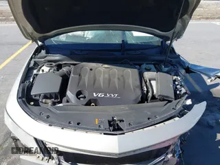 2014 Chevrolet Impala LT with VIN 2G1125S33E9256206, listed as a IAAI auction lot 41829287 with 198,661 mi miles and . Bid and sale history available at DreamBid. Image 10.