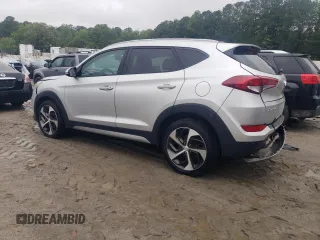 2017 Hyundai Tucson Sport with VIN KM8J33A23HU355807, listed as a Copart auction lot 58431795 with 127,353 mi miles and Salvage title. Bid and sale history available at DreamBid. Image 2.