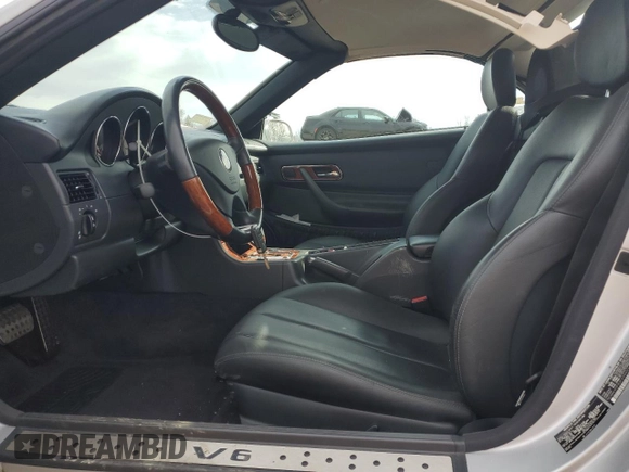2003 Mercedes-Benz SLK 320 with VIN WDBKK65F83F290023, listed as a Copart auction lot 49598115 with 26,196 mi miles and Salvage title. Bid and sale history available at DreamBid. Image 7.