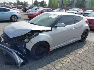 2016 Hyundai Veloster Turbo with VIN KMHTC6AE3GU263387, listed as a IAAI auction lot 42040177 with 96,864 mi miles. Bid and sale history available at carsss.com. Image 2.