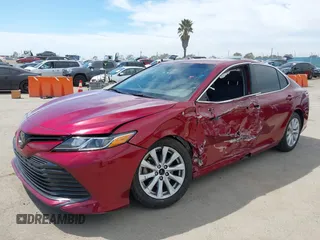2020 Toyota Camry LE with VIN 4T1C11AK9LU991305, listed as a IAAI auction lot 41976371 with 57,422 mi miles and . Bid and sale history available at carsss.com. Image 17.