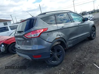 2014 Ford Escape SE with VIN 1FMCU9GX3EUB26129, listed as a IAAI auction lot 41987470 with 139,005 mi miles. Bid and sale history available at carsss.com. Image 4.