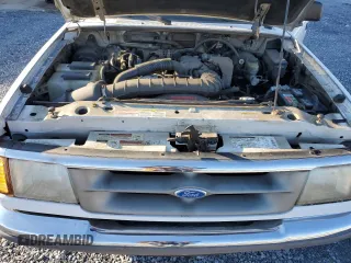 1996 Ford Ranger XL z VIN 1FTCR10U6TUD90403, wystawiony jako Copart lot #45525465 z przebiegiem 57 646 mil mil oraz Szkoda całkowita • Salvage title. Historia ofert i sprzedaży dostępna na DreamBid. Obrazek 12.