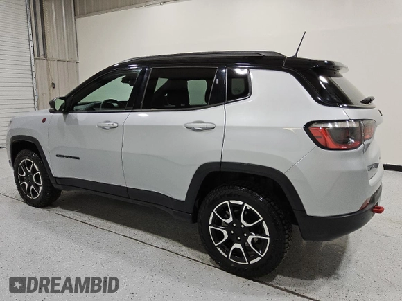 2024 Jeep Compass Trailhawk with VIN 3C4NJDDN5RT149827, listed as a Copart auction lot 55865465 with 31,565 mi miles and Clean title. Bid and sale history available at DreamBid. Image 2.