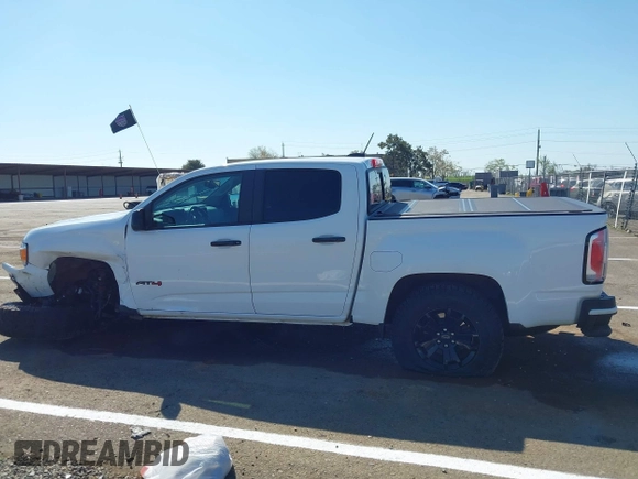 2021 GMC Canyon 4WD AT4 with VIN 1GTG6FEN8M1217042, listed as a IAAI auction lot 41871753 with 65,368 mi miles and . Bid and sale history available at carsss.com. Image 14.