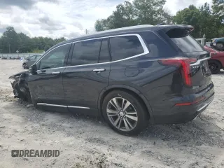 2020 Cadillac XT6 FWD Premium Luxury with VIN 1GYKPCRS9LZ205904, listed as a Copart auction lot 60575174 with 90,432 mi miles and Salvage Title. Bid and sale history available at carsss.com. Image 2.