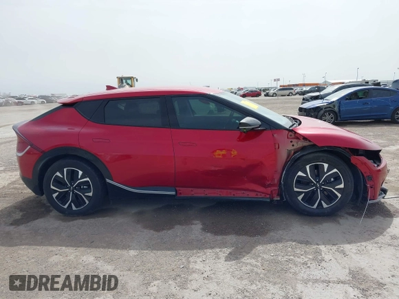 2022 Kia EV6 Wind z VIN KNDC3DLC6N5089018, wystawiony jako IAAI lot #41748175 z przebiegiem 25 157 mil mil oraz . Historia ofert i sprzedaży dostępna na DreamBid. Obrazek 13.