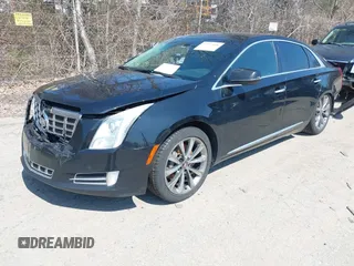 2013 Cadillac XTS Luxury with VIN 2G61P5S3XD9220510, listed as a IAAI auction lot 41977046 with 236,009 mi miles and . Bid and sale history available at DreamBid. Image 16.