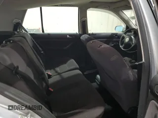 2001 Volkswagen Golf z VIN 9BWGD61J714058300, wystawiony jako Copart lot #77449634 z przebiegiem 137 048 mil mil oraz Szkoda całkowita • Salvage title. Historia ofert i sprzedaży dostępna na DreamBid. Obrazek 10.