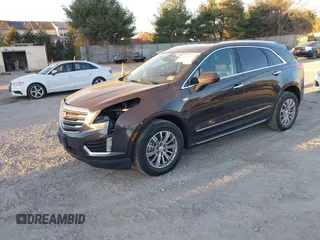 2017 Cadillac XT5 Luxury AWD with VIN 1GYKNDRS5HZ319787, listed as a IAAI auction lot 40819077 with 83,510 mi miles and . Bid and sale history available at DreamBid. Image 2.