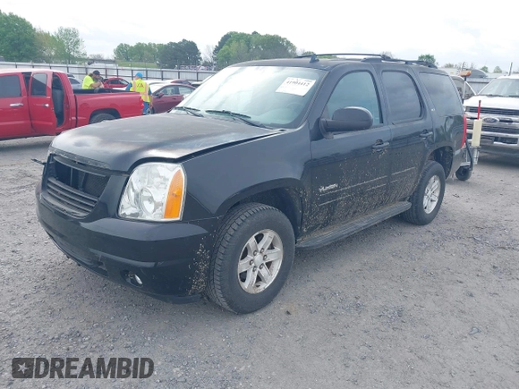 2014 GMC Yukon SLT with VIN 1GKS2CE03ER248683, listed as a IAAI auction lot 41904412 with 147,156 mi miles and . Bid and sale history available at DreamBid. Image 2.