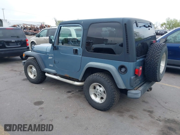 1998 Jeep Wrangler Sport with VIN 1J4FY19S8WP781437, listed as a IAAI auction lot 42096647 with 245,900 mi miles. Bid and sale history available at carsss.com. Image 3.