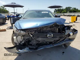 2018 Mazda 3 Touring z VIN 3MZBN1V35JM238103, wystawiony jako Copart lot #56770875 z przebiegiem 66 747 mil mil oraz Szkoda całkowita • Salvage title. Historia ofert i sprzedaży dostępna na DreamBid. Obrazek 5.