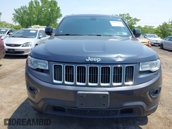 2014 Jeep Grand Cherokee Limited z VIN 1C4RJFBG7EC273458, wystawiony jako IAAI lot #42458515 z przebiegiem 161 090 mil mil oraz . Historia ofert i sprzedaży dostępna na DreamBid. Obrazek 12.