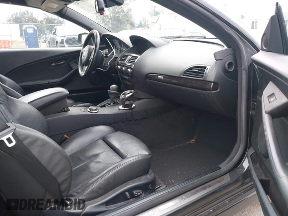 2007 BMW 6 Series 650i with VIN WBAEK13507CN81020, listed as a IAAI auction lot 42167743 with 127,552 mi miles. Bid and sale history available at carsss.com. Image 5.