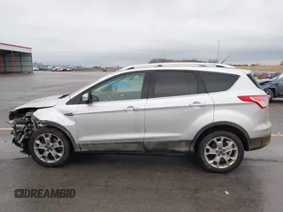 2015 Ford Escape Titanium with VIN 1FMCU9J97FUA84589, listed as a IAAI auction lot 41688156 with 129,073 mi miles. Bid and sale history available at carsss.com. Image 15.