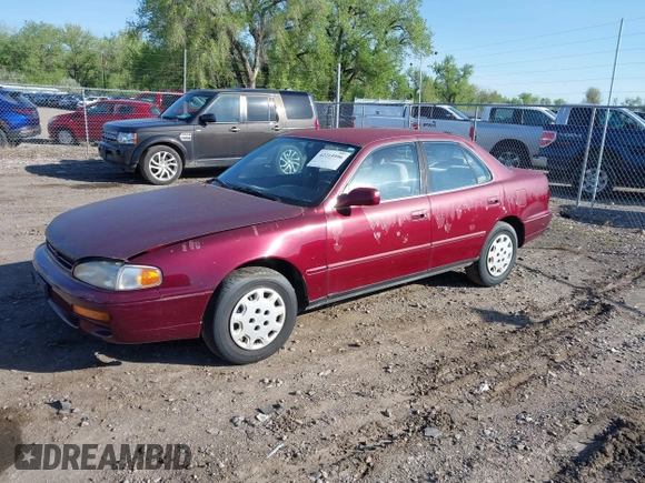 1996 Toyota Camry DX with VIN JT2BG12K4T0363844, listed as a IAAI auction lot 42215996 with 214,452 mi miles and . Bid and sale history available at DreamBid. Image 2.