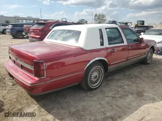 1995 Lincoln Town Car Signature with VIN 1LNLM82W2SY713693, listed as a Copart auction lot 75430484 with 156,859 mi miles and Salvage Title. Bid and sale history available at carsss.com. Image 3.