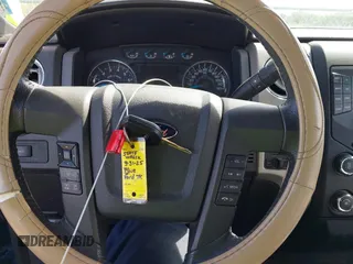 2014 Ford F-150 XL with VIN 1FTFW1CF4EKF14279, listed as a IAAI auction lot 42006454 with 104,648 mi miles. Bid and sale history available at carsss.com. Image 11.