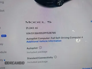 2023 Tesla Model S with VIN 5YJSA1E52PF528795, listed as a IAAI auction lot 42110660 with 21,243 mi miles and . Bid and sale history available at DreamBid. Image 7.
