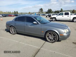 2005 Jaguar S-Type with VIN SAJWA01T15FN13800, listed as a Copart auction lot 53576305 with 182,533 mi miles and Salvage Title. Bid and sale history available at DreamBid. Image 4.