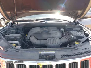 2011 Jeep Grand Cherokee Laredo with VIN 1J4RR4GGXBC587911, listed as a IAAI auction lot 42156885 with 178,999 mi miles and . Bid and sale history available at DreamBid. Image 10.