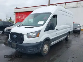 2023 Ford Transit Cargo with VIN 1FTBR3U89PKA09391, listed as a IAAI auction lot 41993662 with 36,147 mi miles and . Bid and sale history available at DreamBid. Image 17.