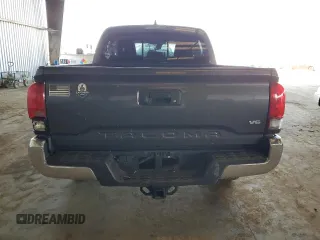 2018 Toyota Tacoma SR5 with VIN 3TMAZ5CN9JM075289, listed as a Copart auction lot 52409365 with 65,793 mi miles and Salvage Title. Bid and sale history available at DreamBid. Image 6.