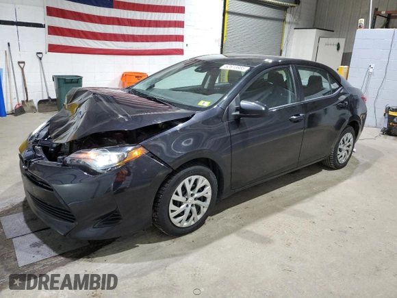 2019 Toyota Corolla L with VIN 2T1BURHE5KC185821, listed as a Copart auction lot 52613985 with 104,208 mi miles and Salvage title. Bid and sale history available at DreamBid. Image 1.