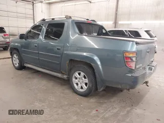2006 Honda Ridgeline RTL with VIN 2HJYK16556H508101, listed as a IAAI auction lot 41909651 with 301,945 mi miles. Bid and sale history available at carsss.com. Image 3.