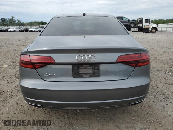 2017 Audi A8 z VIN WAU44AFD1HN009176, wystawiony jako Copart lot #57647675 z przebiegiem 94 317 mil mil oraz Szkoda całkowita • Salvage title. Historia ofert i sprzedaży dostępna na DreamBid. Obrazek 6.