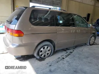 2003 Honda Odyssey EX-L with VIN 5FNRL18963B087397, listed as a Copart auction lot 62392415 with 261,737 mi miles and Salvage title. Bid and sale history available at DreamBid. Image 3.