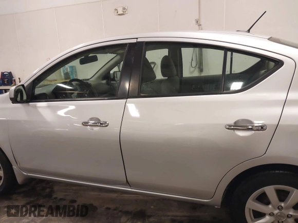 2012 Nissan Versa SV with VIN 3N1CN7AP2CL938479, listed as a IAAI auction lot 41918877 with 150,000 mi miles and . Bid and sale history available at DreamBid. Image 14.
