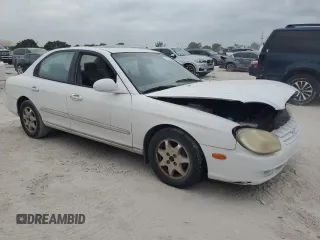 2000 Hyundai Sonata GLS with VIN KMHWF35V0YA347621, listed as a Copart auction lot 76346874 with 164,489 mi miles and Salvage Title. Bid and sale history available at carsss.com. Image 4.
