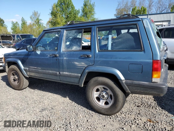 1999 Jeep Cherokee Sport with VIN 1J4FT68S1XL577603, listed as a Copart auction lot 54216115 with 180,128 mi miles and Salvage title. Bid and sale history available at DreamBid. Image 2.