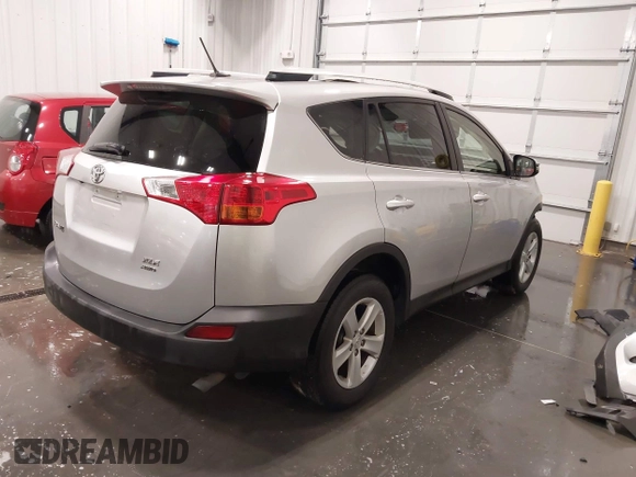 2014 Toyota RAV4 XLE with VIN JTMRFREV5ED052819, listed as a IAAI auction lot 42014672 with 235,481 mi miles and . Bid and sale history available at DreamBid. Image 4.